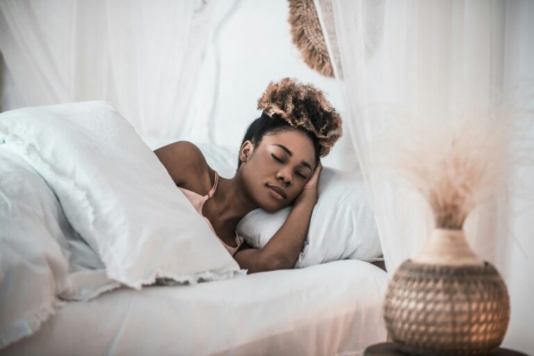 A woman sleeping in bed