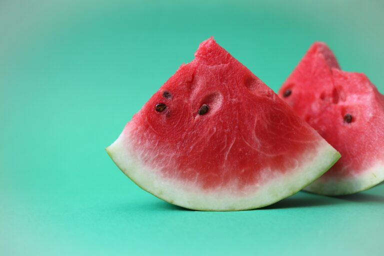 A watermelon wedges on a blue background